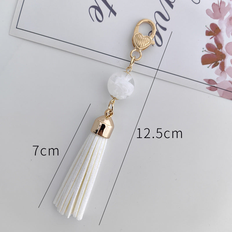 Tassel Bag Pendant In White Featuring PU Leather Material, Stylish Keychain Accessory