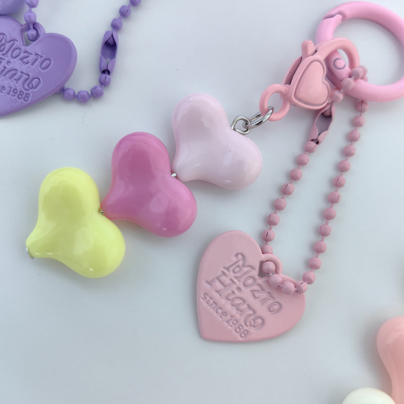 Heart Shape Keychain With Letter Pattern In Plastic Material, Available In White Color