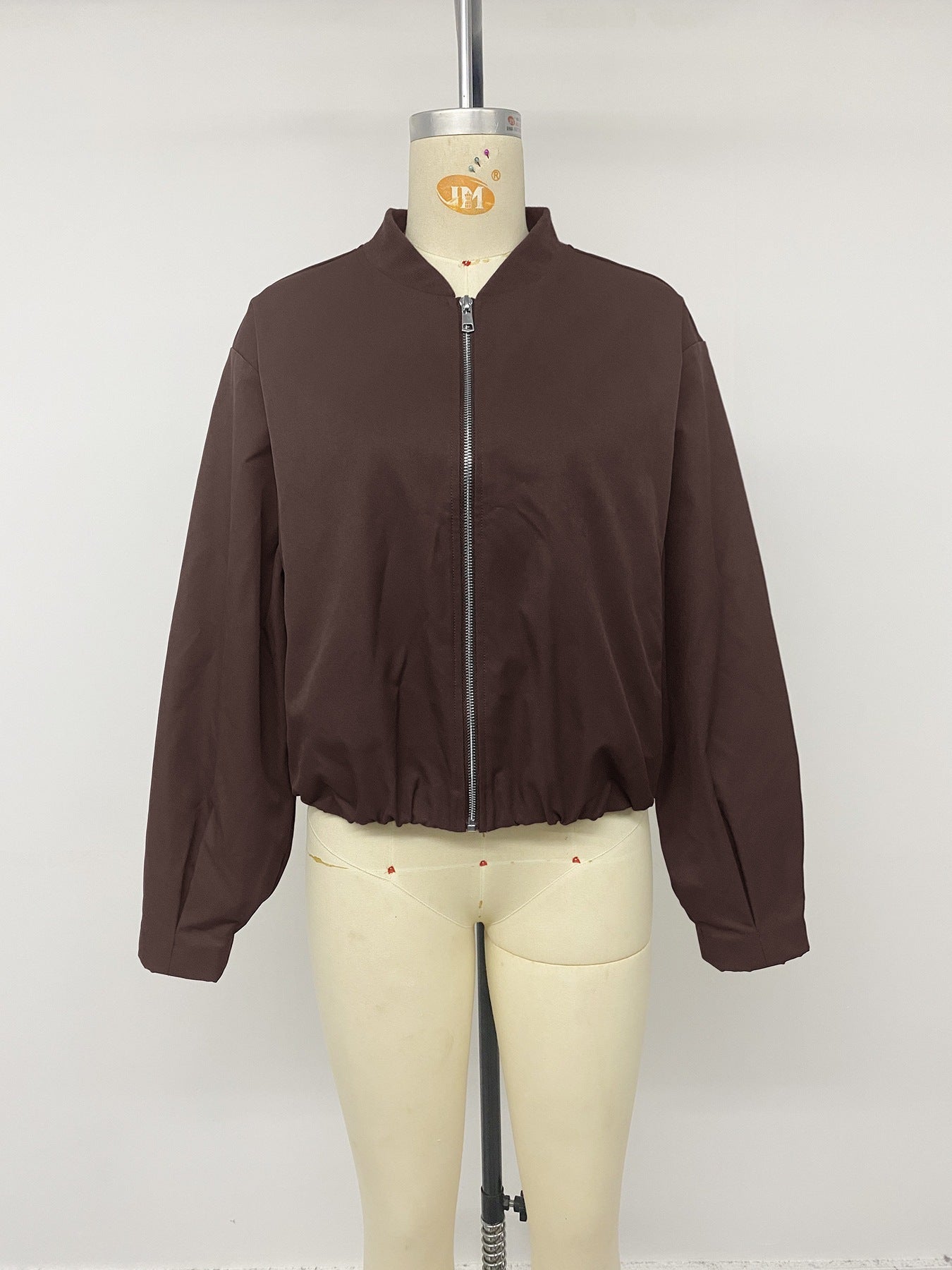 Solid Color Streetwear Coat With Zipper Placket, Featuring Patchwork Craftsmanship In Polyester Fabric And Standing Collar