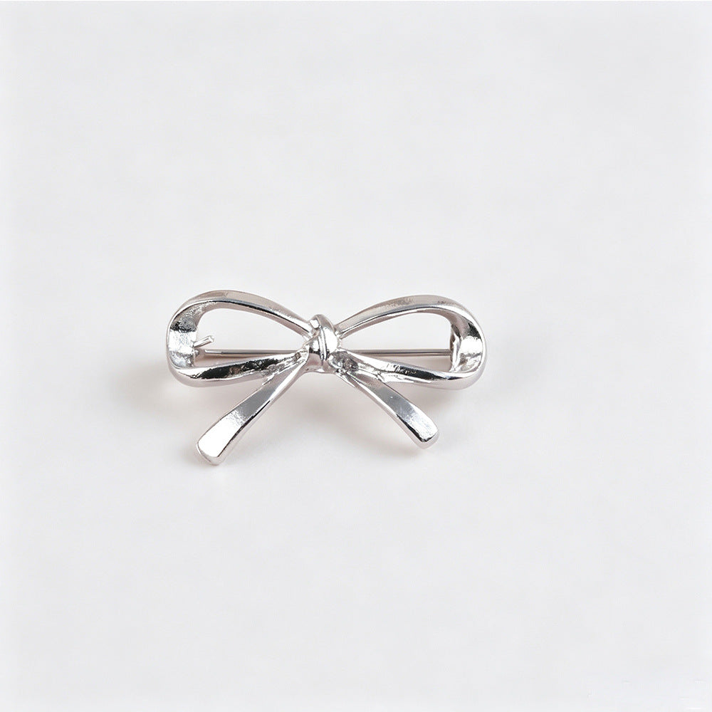 Gold Alloy Bow Tie Pin With Electroplated Finish