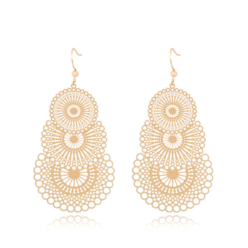 Golden geometric leaf copper earrings