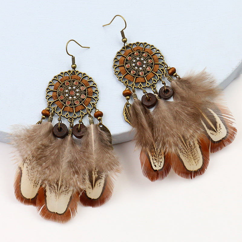 Feather round hollow retro earrings