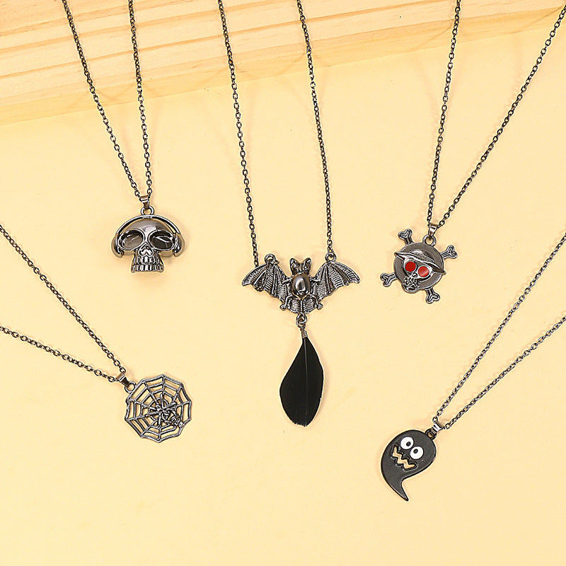 Skull bat pumpkin head earrings