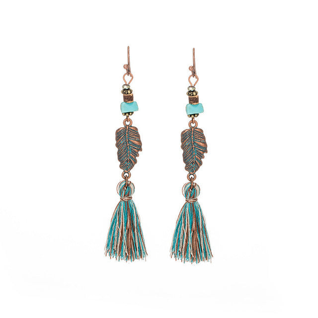 Fashion hollow carved alloy tassel earrings