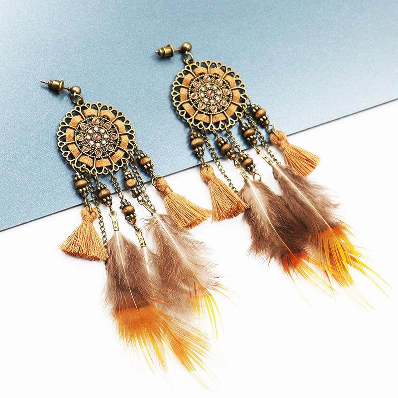 Handmade tassel Creative feather pendant leather wood bead crystal Earrings Wholesale