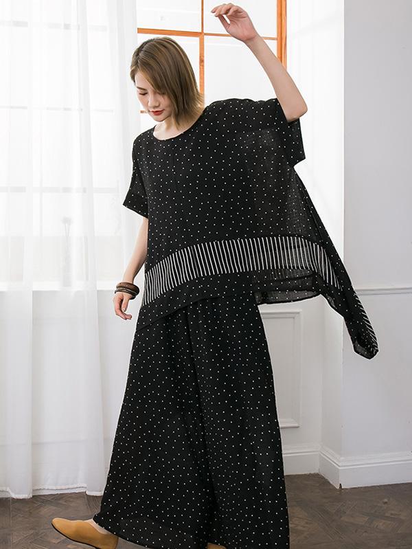 Woman Loosen Dress Suit in White Spots on Black