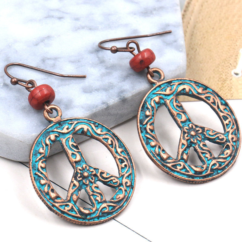 Flower-patterned openwork literary earrings
