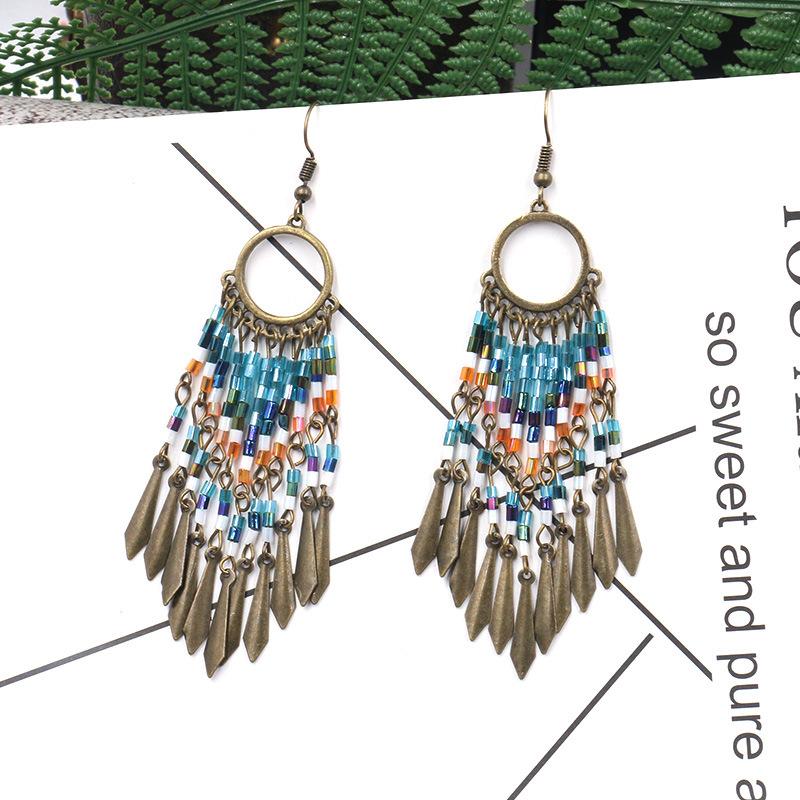 Fashion Round Cutout Creative Beizhu Tassel Bohemian Earrings