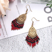 Creative beaded tassel stylish round openwork earrings