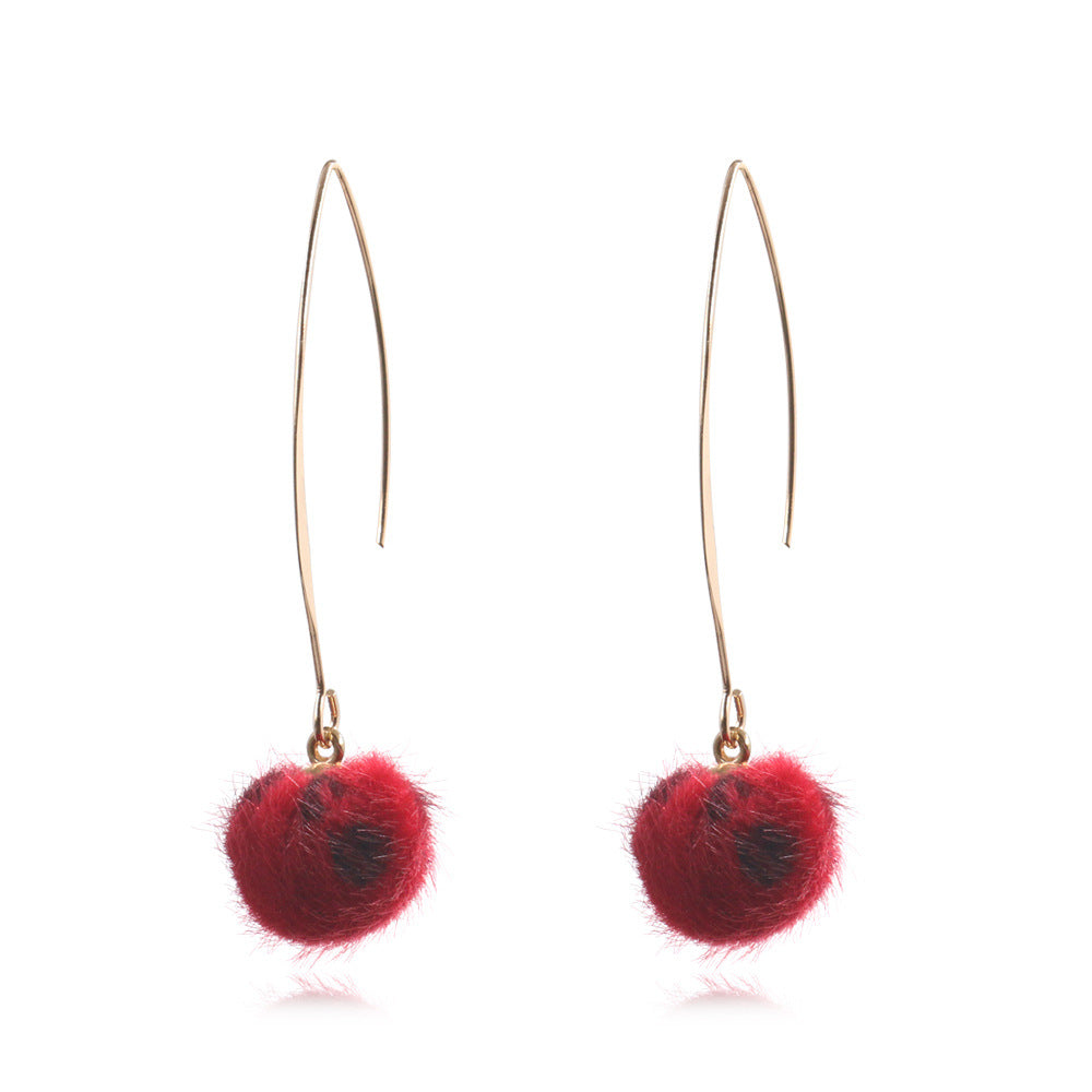 Leopard hair ball earrings