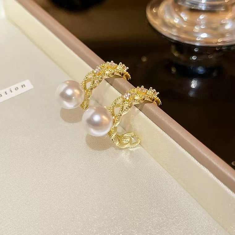 S925 silver needle simple inlaid hollow pearl earrings