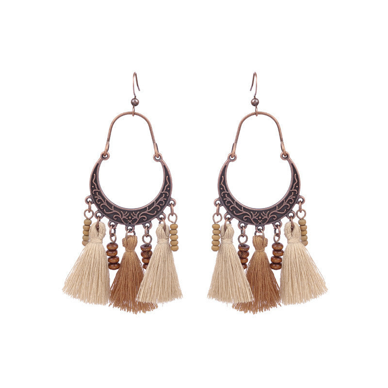 Fashion retro wooden beads hand-woven geometric hollow tassel earrings