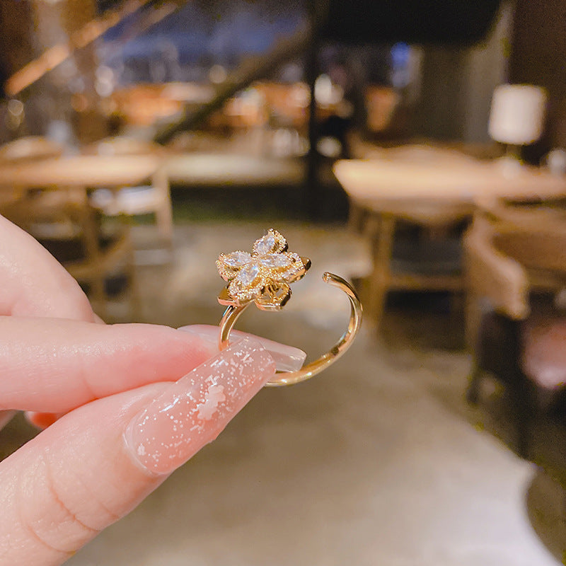 WHOLESALE rotating windmill ring inlaid with zircon