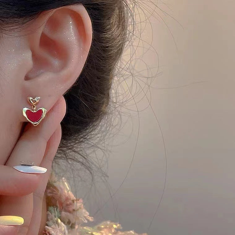 Simple and small red love earrings