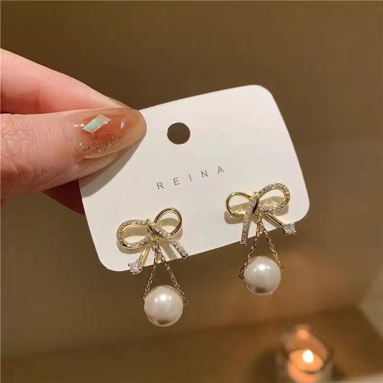 S925 silver needle tide pearl bow earrings