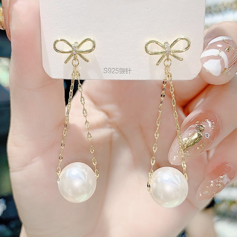 Bow red diamond ball earrings