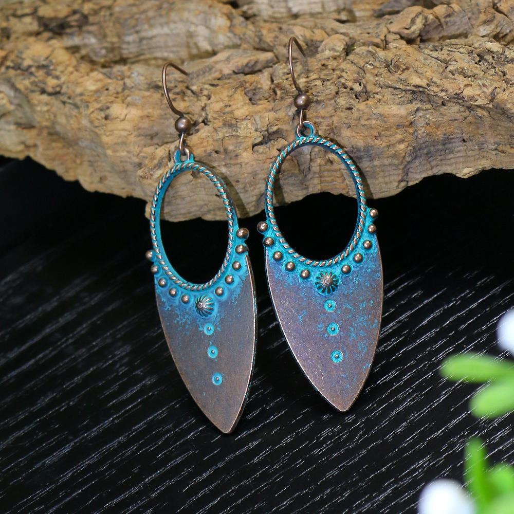 Wind leaf round openwork turquoise earrings