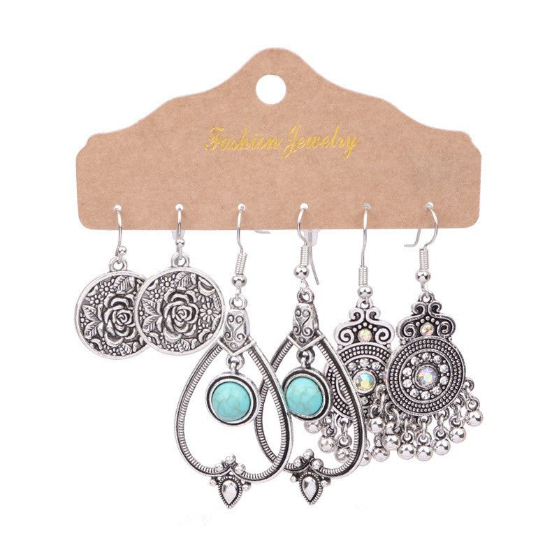 Irregular silver butterfly tassel earrings