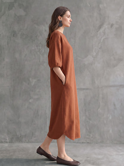 Solid Color Pockets Three-quarter Sleeves Loose Round-neck Midi Dresses