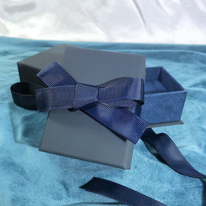 Paper Jewelry Box With Bow Tie Design In Dark Blue, Featuring Love Charms For Elegant Jewelry Packaging