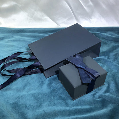 Paper Jewelry Box With Bow Tie Design In Dark Blue, Featuring Love Charms For Elegant Jewelry Packaging