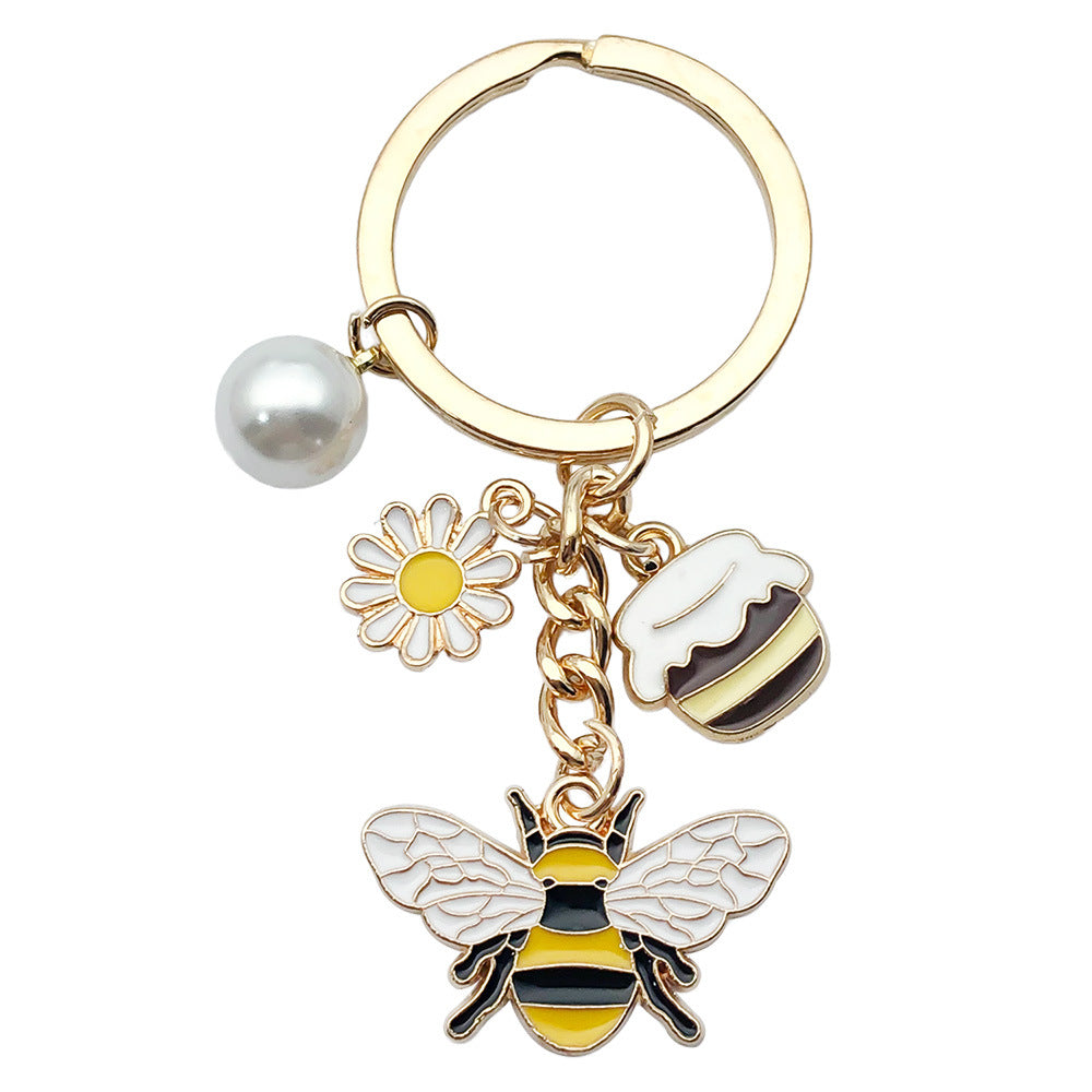 Bee Honeycomb Pendant Featuring A Detailed Bee Pattern In Durable Alloy, Available In Yellow