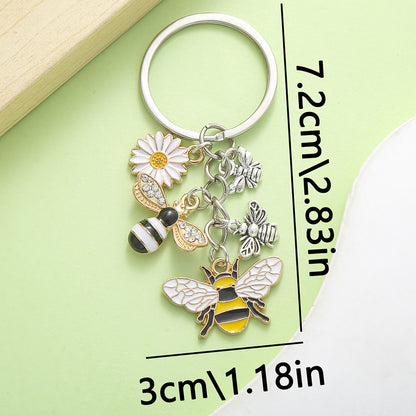 Bee Honeycomb Pendant Featuring A Detailed Bee Pattern In Durable Alloy, Available In Yellow