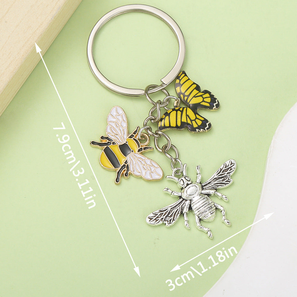 Bee Honeycomb Pendant Featuring A Detailed Bee Pattern In Durable Alloy, Available In Yellow