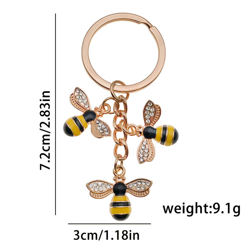 Bee Honeycomb Pendant Featuring A Detailed Bee Pattern In Durable Alloy, Available In Yellow