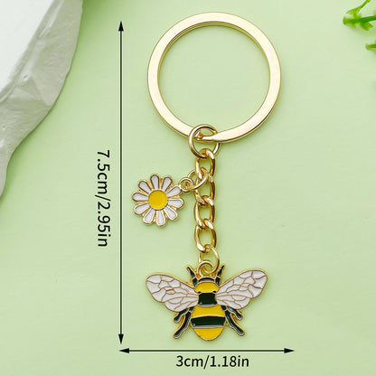 Bee Honeycomb Pendant Featuring A Detailed Bee Pattern In Durable Alloy, Available In Yellow