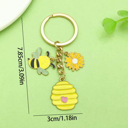 Bee Honeycomb Pendant Featuring A Detailed Bee Pattern In Durable Alloy, Available In Yellow