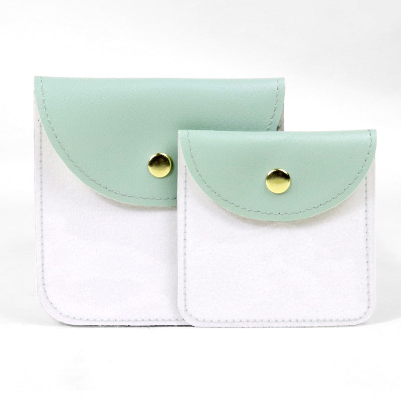 Transparent PU Leather Jewelry Storage Bag Suitable For Necklaces And Bracelets Packaging Dustproof Bag Solid Color Asymmetric Design