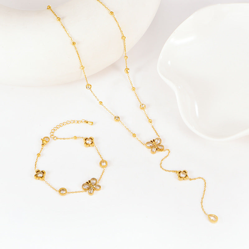 Butterfly Bracelet Hollow Four-leaf Flower White Diamond Stainless Steel Gold Tassel Collarbone Necklace Women's Jewelry Set