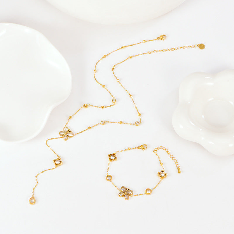 Butterfly Bracelet Hollow Four-leaf Flower White Diamond Stainless Steel Gold Tassel Collarbone Necklace Women's Jewelry Set