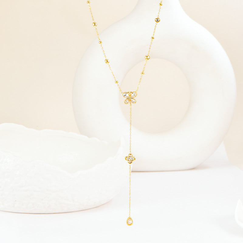 Butterfly Bracelet Hollow Four-leaf Flower White Diamond Stainless Steel Gold Tassel Collarbone Necklace Women's Jewelry Set