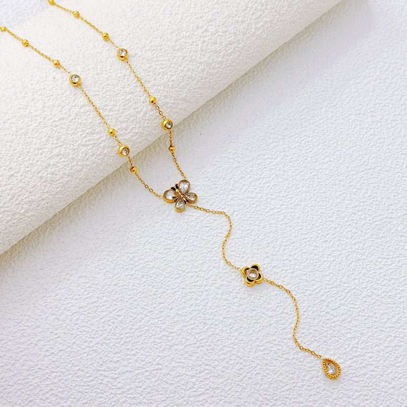 Butterfly Bracelet Hollow Four-leaf Flower White Diamond Stainless Steel Gold Tassel Collarbone Necklace Women's Jewelry Set