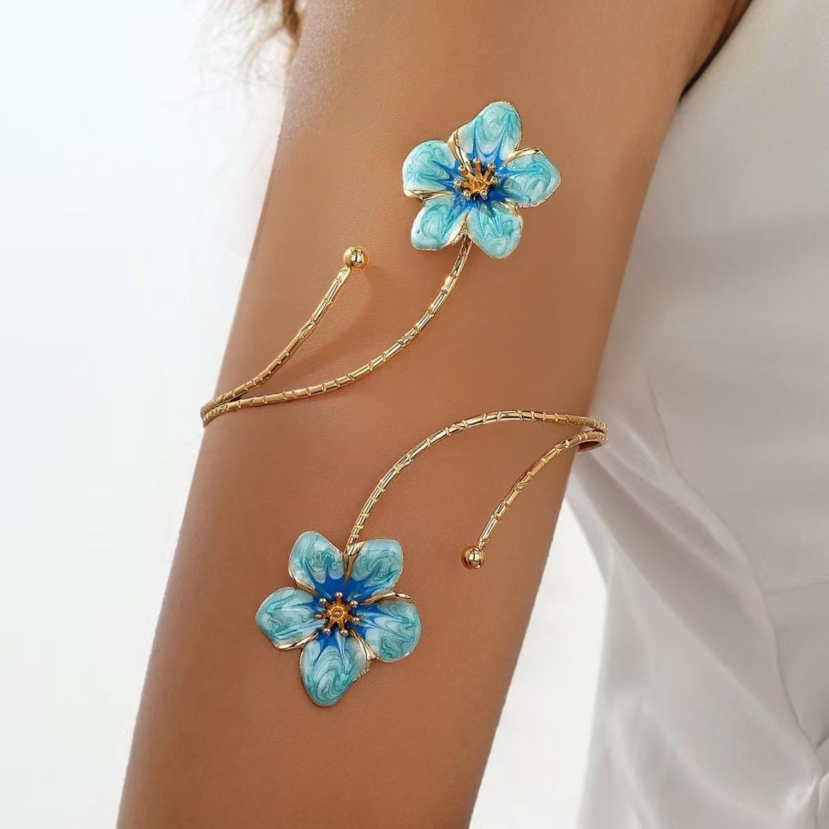 Flower Pattern Metal Arm Cuff Featuring Enamel Craft In Gold And Sky Blue Colors For Stylish Wear