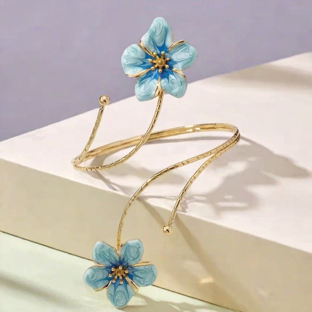 Flower Pattern Metal Arm Cuff Featuring Enamel Craft In Gold And Sky Blue Colors For Stylish Wear