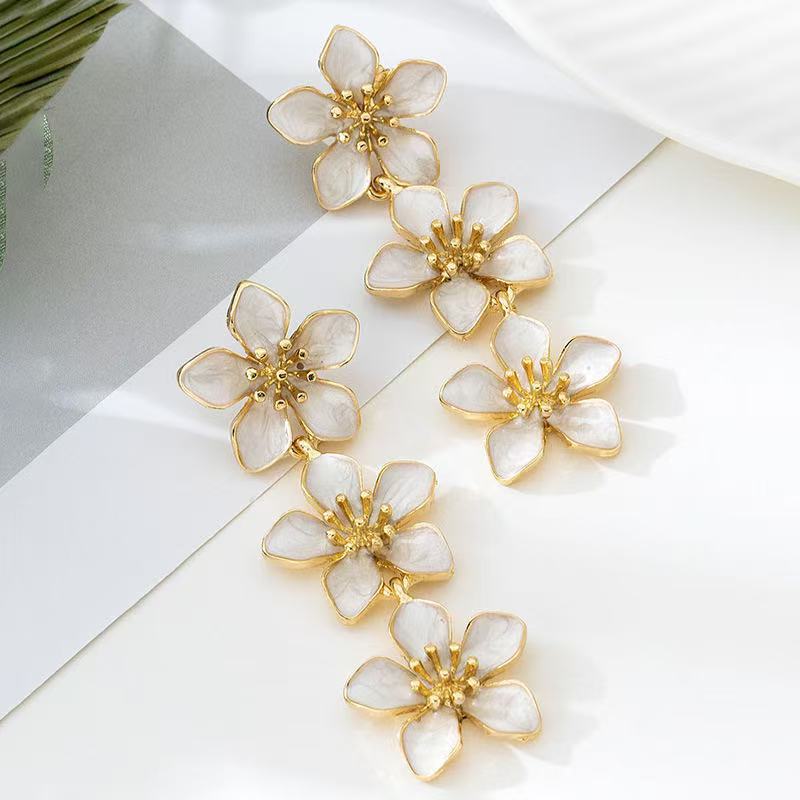 Pastoral Flower Drop Earrings For Women Featuring Enamel Craft In Orange And White Colors
