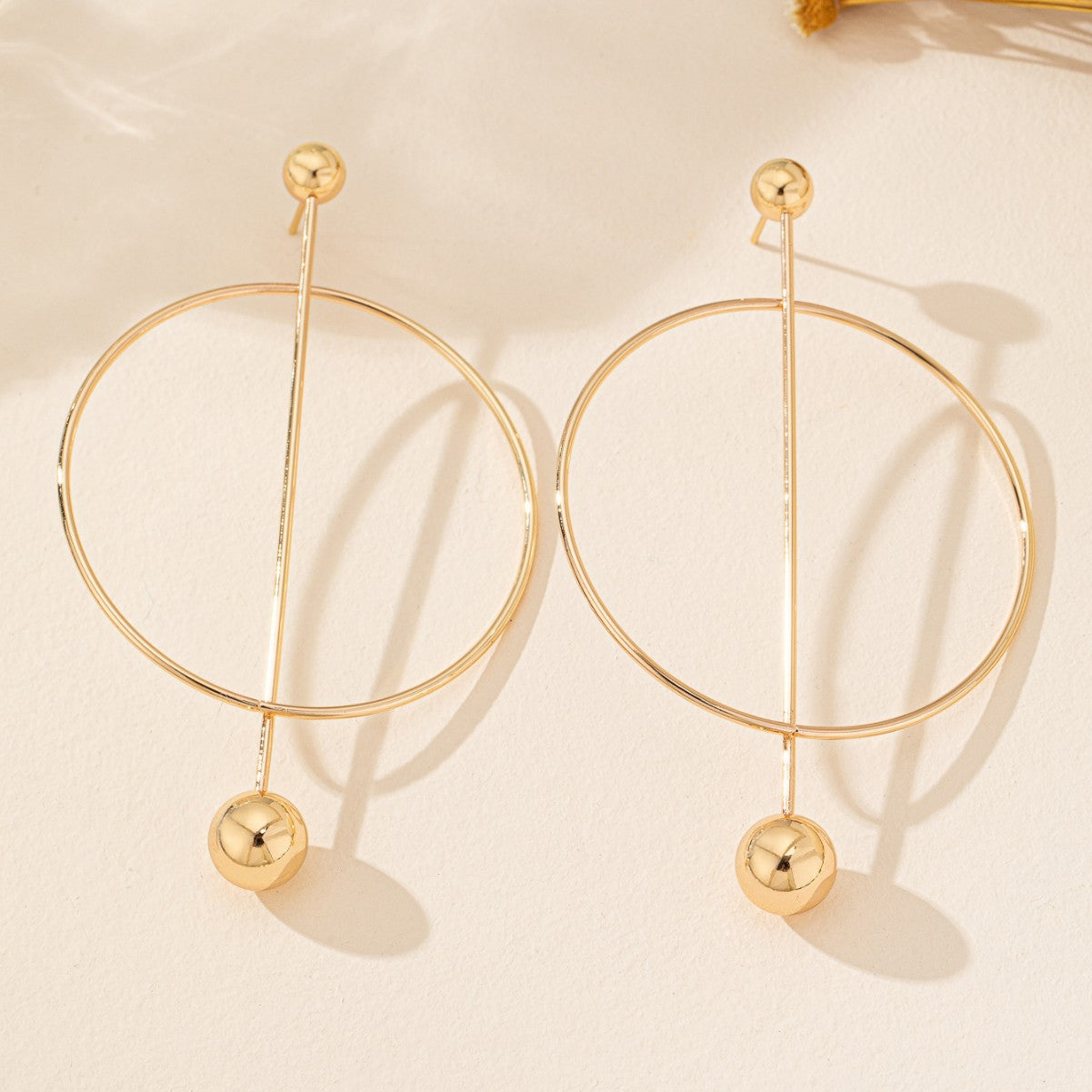 Gold Drop Earrings For Women Featuring Elegant Circle Pattern Design