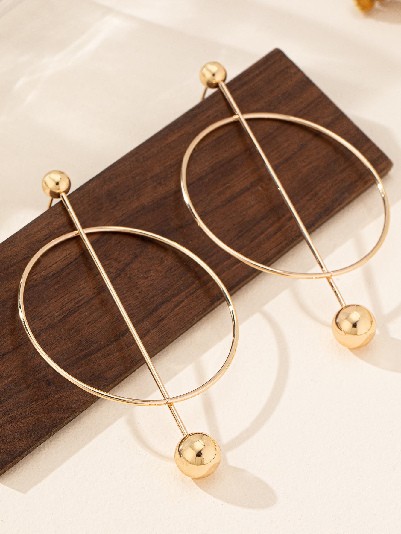 Gold Drop Earrings For Women Featuring Elegant Circle Pattern Design