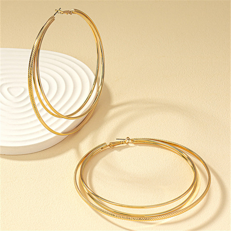 Round Gold Earrings Featuring Geometric Design, Perfect For Elegant Everyday Wear