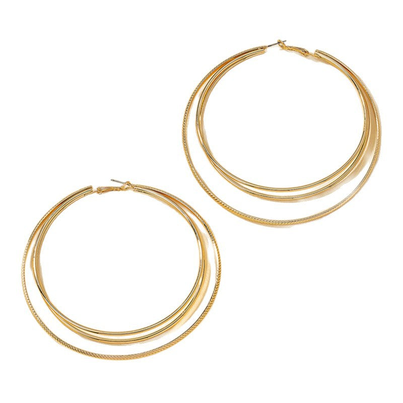 Round Gold Earrings Featuring Geometric Design, Perfect For Elegant Everyday Wear