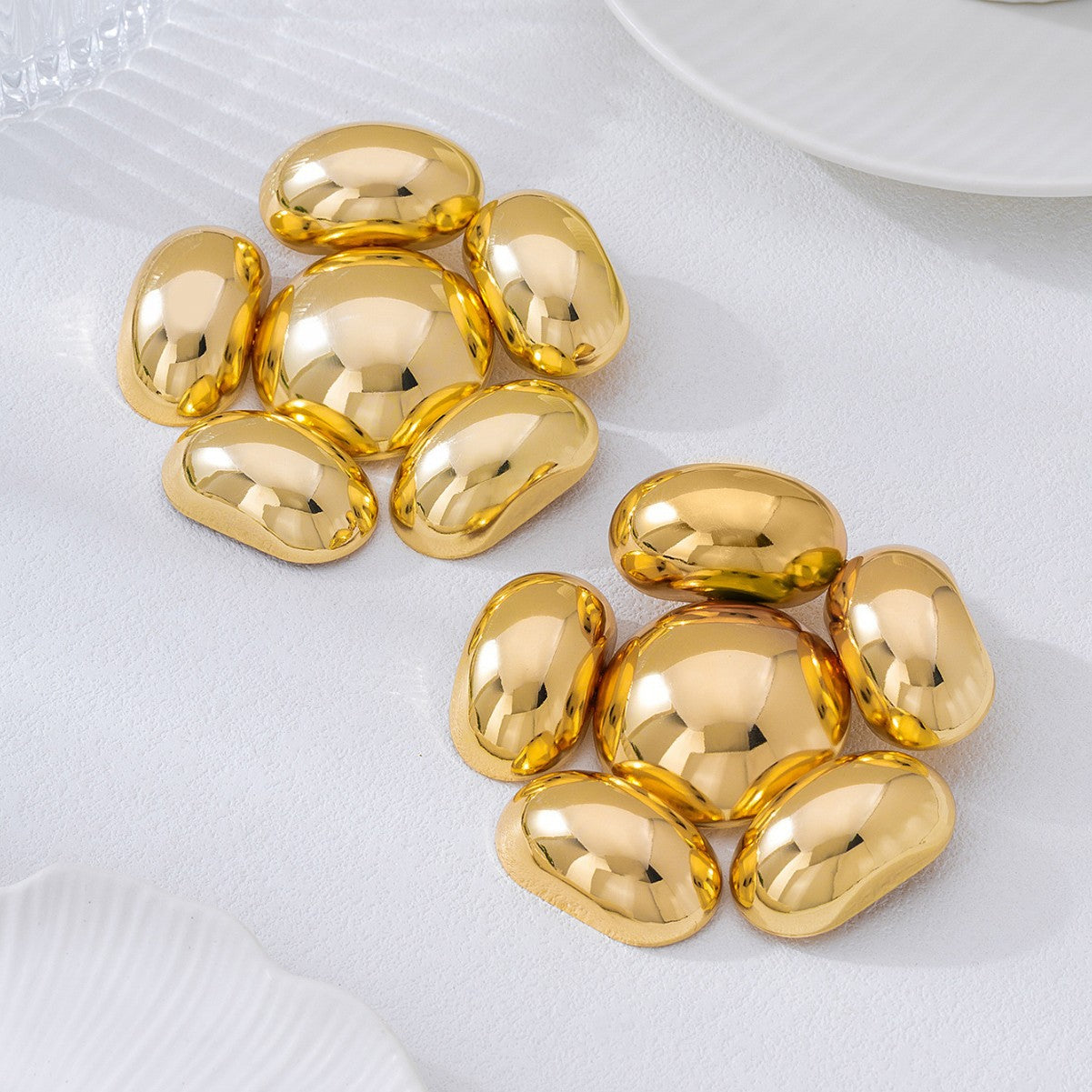 Exaggerated Petal Earrings In Gold, Featuring A Bold And Stylish Design For A Unique Look