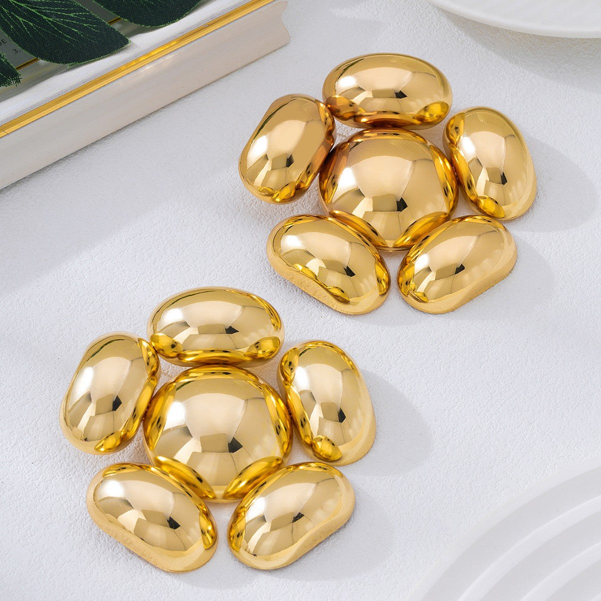 Exaggerated Petal Earrings In Gold, Featuring A Bold And Stylish Design For A Unique Look