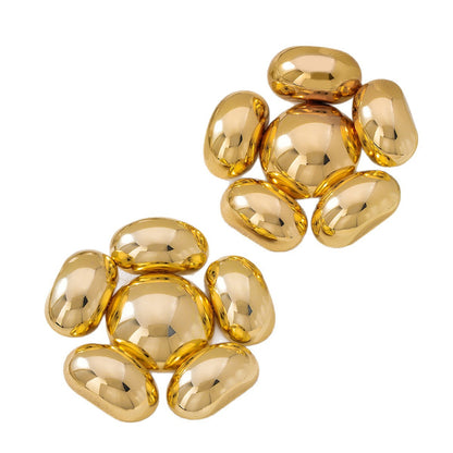 Exaggerated Petal Earrings In Gold, Featuring A Bold And Stylish Design For A Unique Look