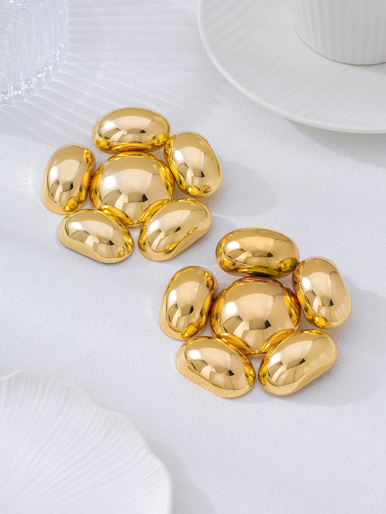 Exaggerated Petal Earrings In Gold, Featuring A Bold And Stylish Design For A Unique Look