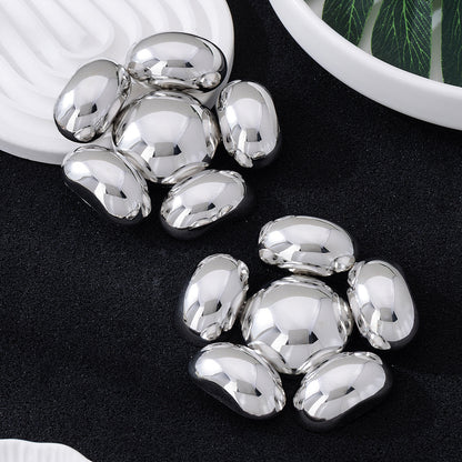 Exaggerated Petal Earrings In Gold, Featuring A Bold And Stylish Design For A Unique Look