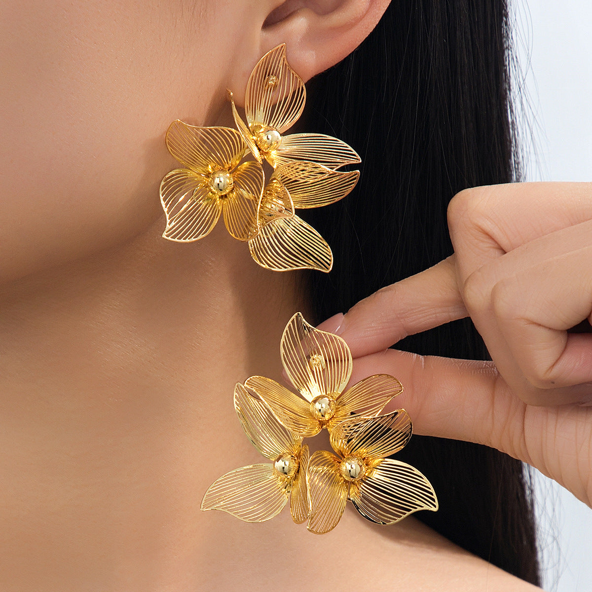 Pastoral Flower Earrings In Gold Featuring Metal Petal Design For Elegant Style