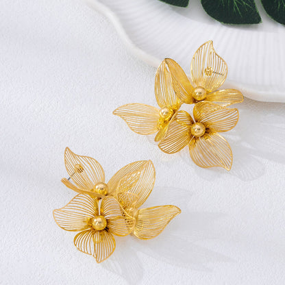 Pastoral Flower Earrings In Gold Featuring Metal Petal Design For Elegant Style